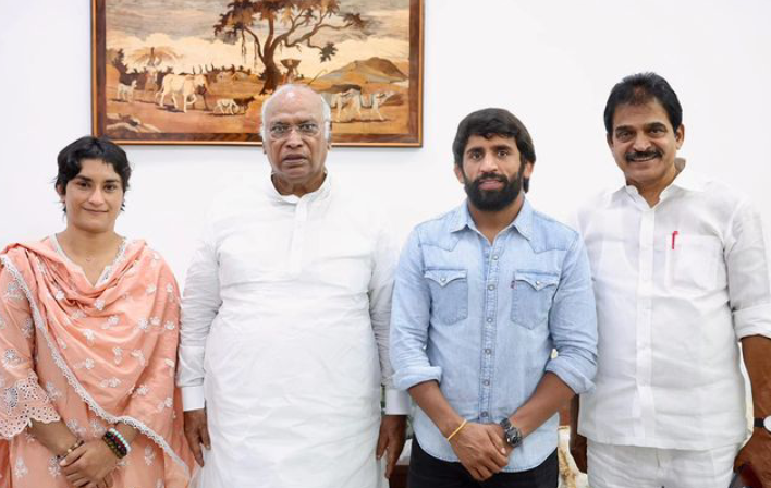 Vinesh Phogat with congress leader kharge